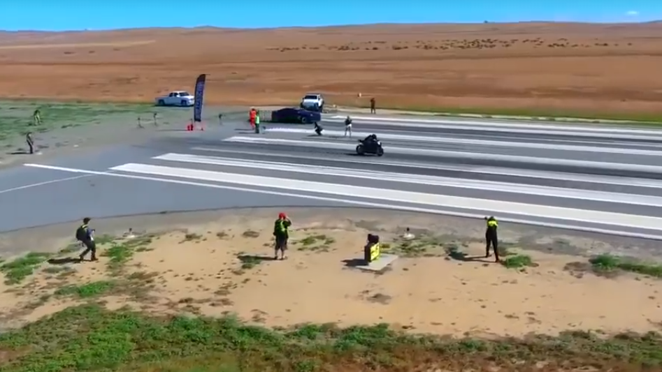 This is what happens when a car drag races a bike!